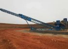 Rail-mounted telescopic conveyor in fixed stockyard for bulk material handling