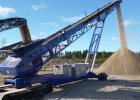 High-mobility crawler conveyor in construction site with rapid setup