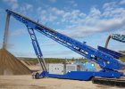 Rapid deployment crawler-mounted telescopic conveyor system in action