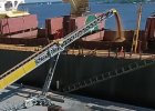 High-speed ship loader operating at port terminal for efficient cargo transfer