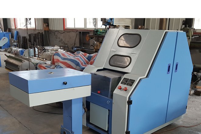 Máquina de cardado de muestras planas