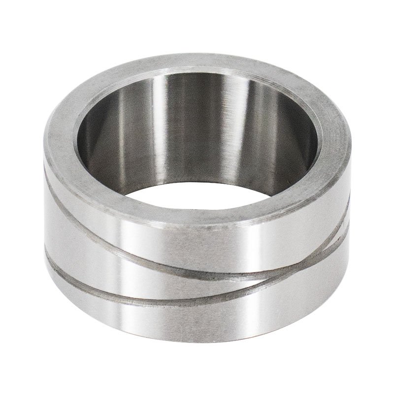 Heat-treated steel bushing component designed for long wear cycles
