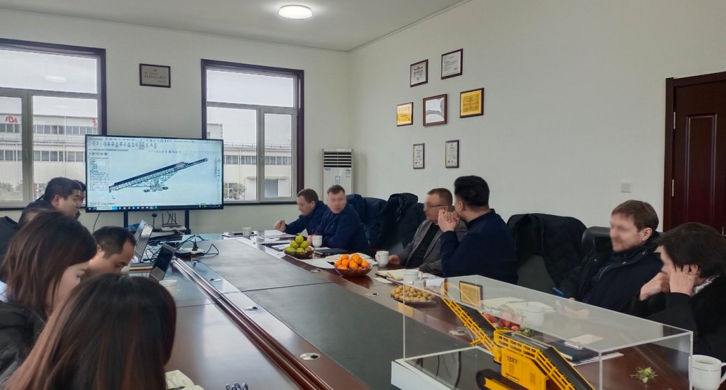 TSKY Showcases Innovative Mobile Telescopic Stacker to Visiting Client, Solidifying Partnership