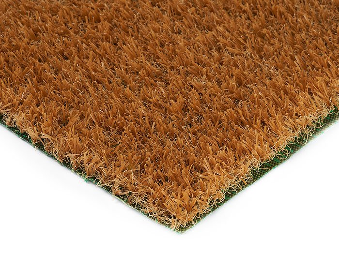 Synthetic grass around amusement park rides