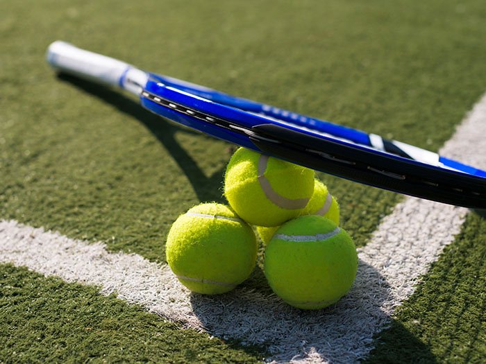 Durable synthetic hard court surface