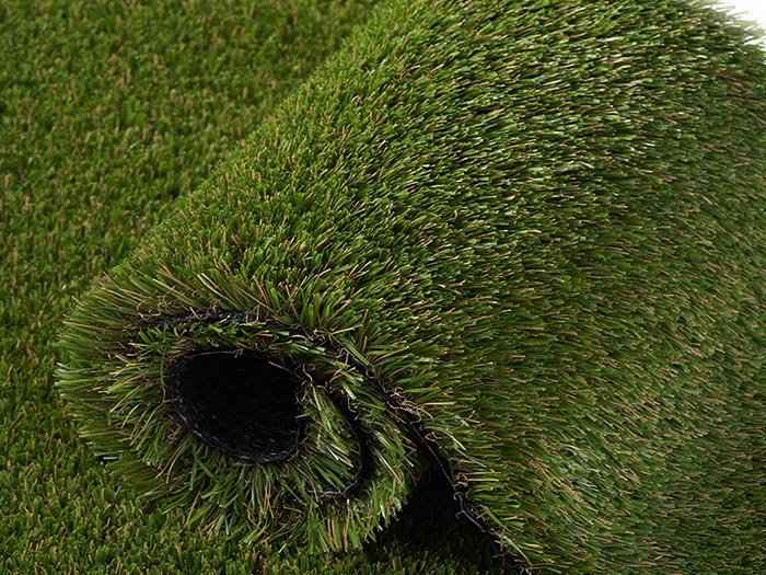 Artificial turf with drainage system in hotel outdoor area