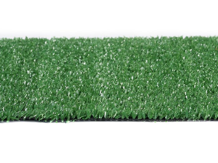 Employees relaxing on artificial grass in office courtyard