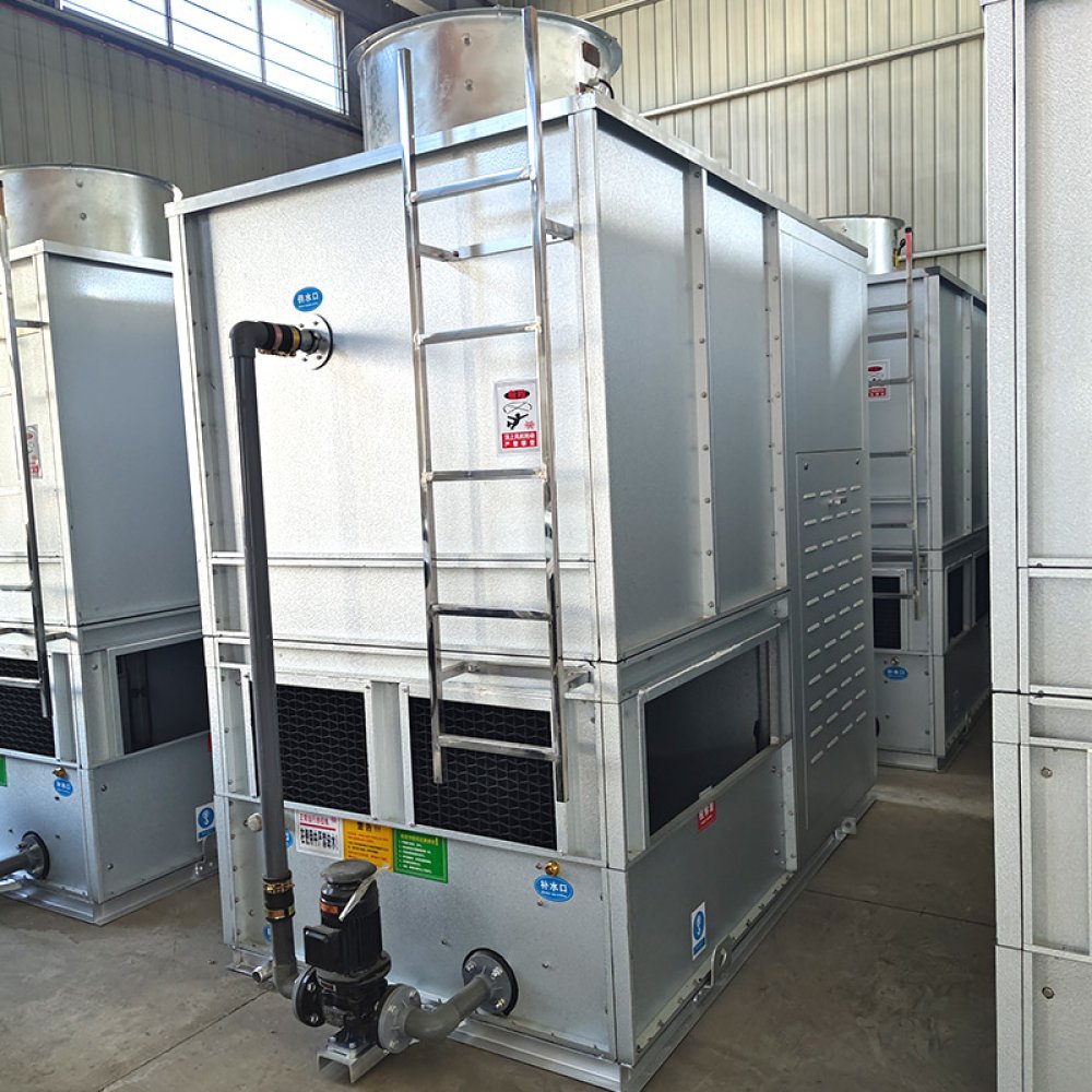 Integrated cooling tower and condenser system