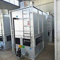Integrated cooling tower and condenser system
