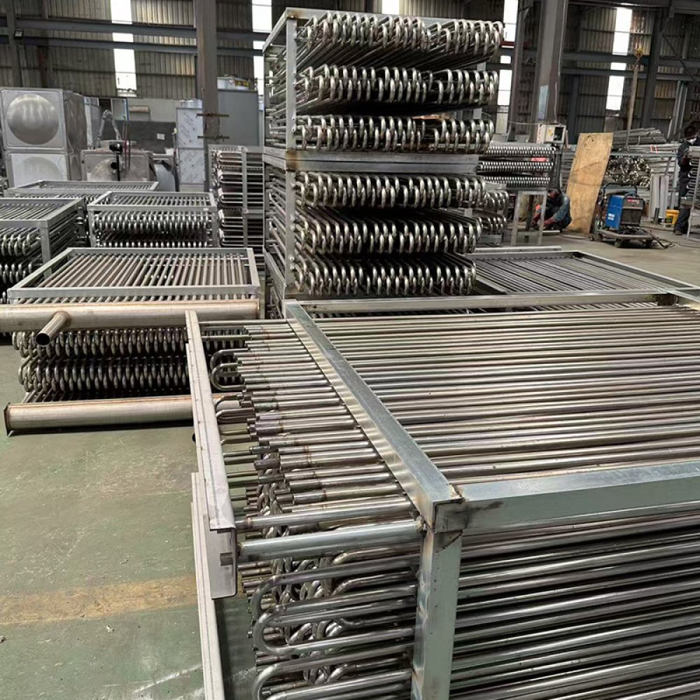 Evaporative cooling condenser coil for process fluids