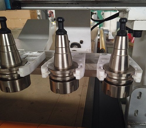 Inline automatic tool changer