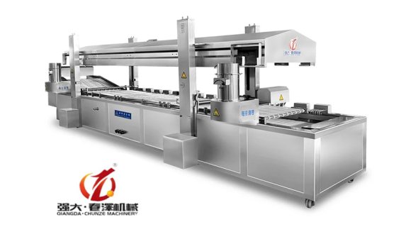 Continuous fryer for industrial food processing