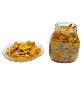 golden nameko mushrooms in glass jars