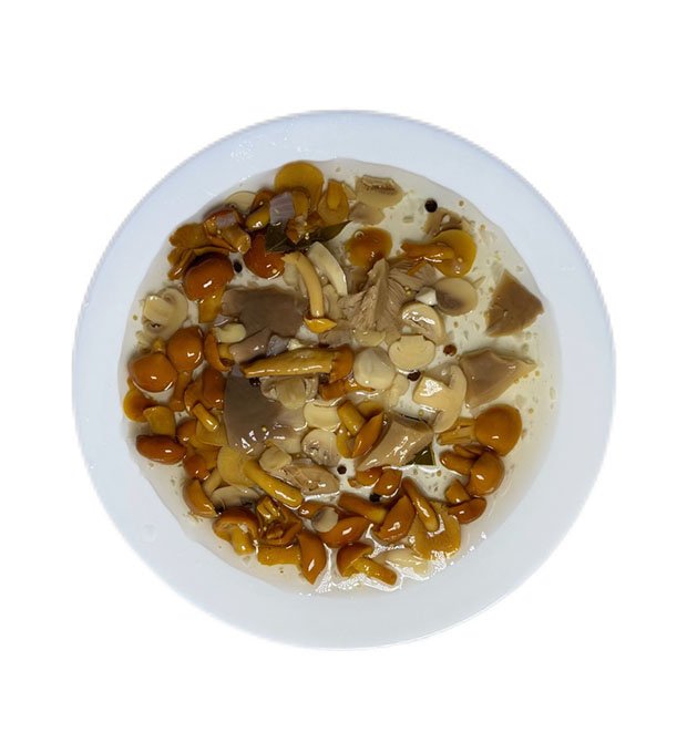 mixed mushrooms in glass jar