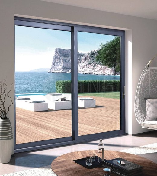 SISTEMA DE PUERTA CORREDERA ELEVABLE DE ALUMINIO CON ROTURA DE PUENTE TÉRMICO TALSD120
