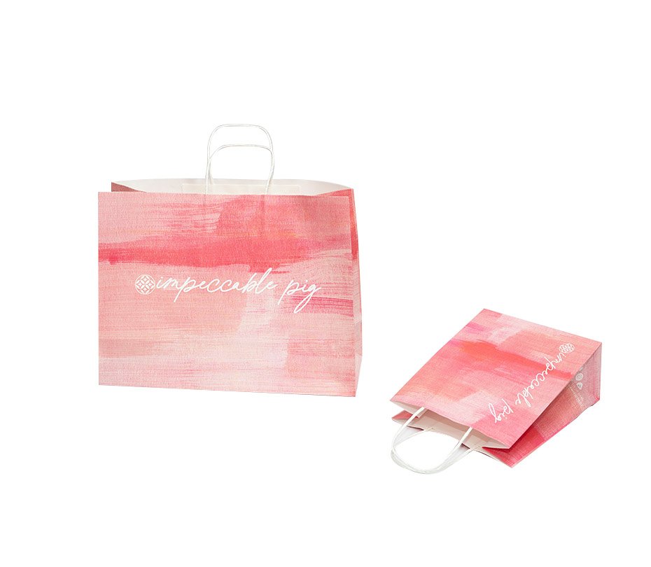 Twisted paper handle shopper