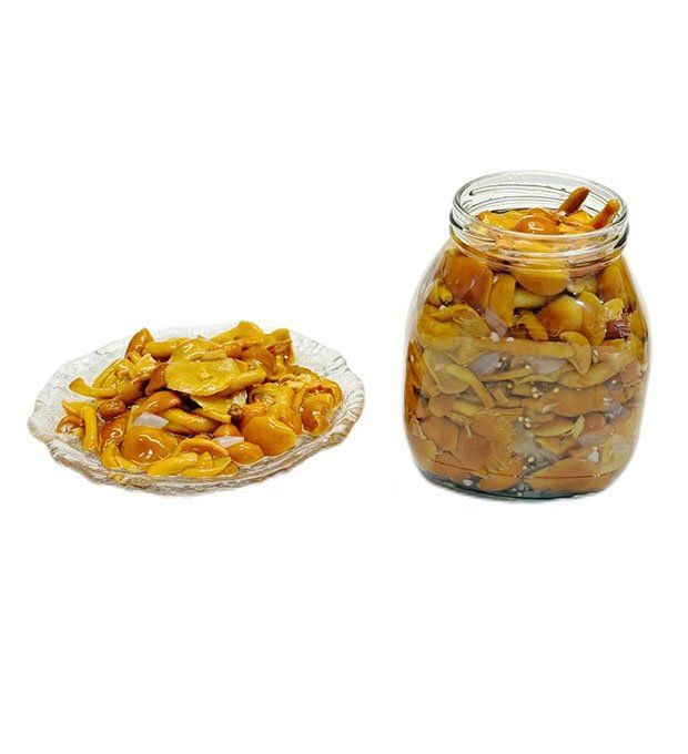 golden nameko mushrooms in glass jars
