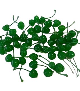 green maraschino cherries arranged in plate