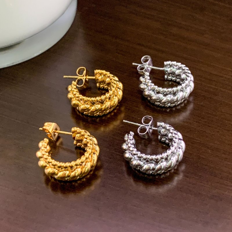C-shaped hoop earrings with twisted edges