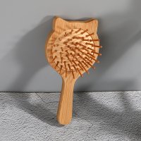 楠竹气垫猫梳（约长：15 宽：7.5 高：15cm）Opp